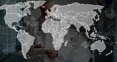 Senior male doctor tapping tablet beside bed showing global health map, borders and network nodes - Powered by Adobe