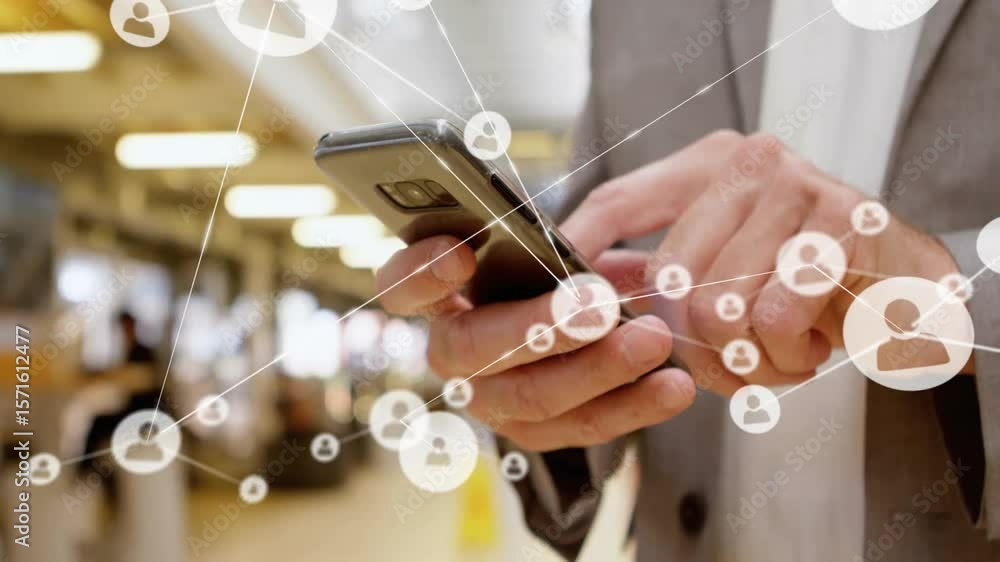 Poster businessman tapping smartphone in corridor generating network nodes linking into technology overlay