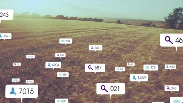 Camera drifting forward over wheat field causing popping data labels showing crop analytics fading