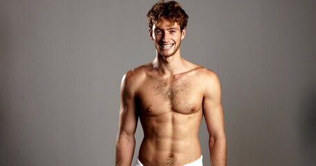 Happy man, face or studio with skincare for dermatology, hygiene or confidence on a gray background. Portrait, male person or shirtless model with smile or glowing skin for wellness on mockup space