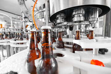 Automated beer bottling process in a modern brewery facility