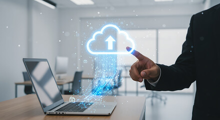 Businessman interacting with cloud computing upload technology on laptop digital transformation concept