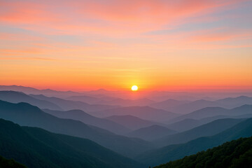 Obraz premium Majestic mountain range bathed in golden sunrise hues mountains clouds