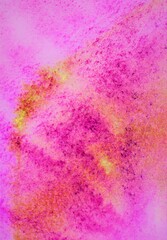 abstract pink watercolor background with stains and splashes on paper