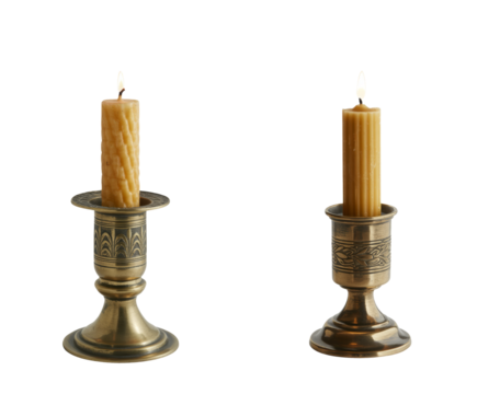 vintage brass candlestick holder with an ornate carved pattern isolated