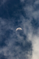 Moon and clouds in the blue sky, 