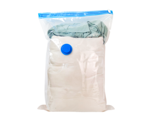 Clear plastic vacuum seal bag filled with folded clothes and a blue valve isolated on transparent background