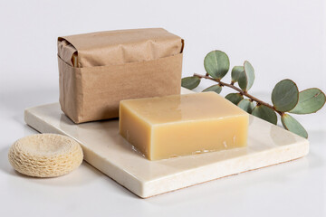 Artisanal, natural handmade soap bars with eucalyptus leaves, showcasing eco-friendly packaging and organic ingredients for a relaxing spa, beauty, and self-care routine