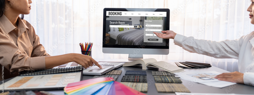 Poster group of interior architect designer team at table choosing various mood board samples with architec