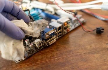 Cleaning your personal computer from dust and dirt. Wipe the dust with a damp cloth on office equipment.