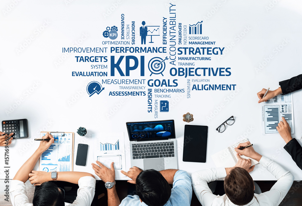 Aufkleber a diverse business team collaborates around a table focusing on kpis, strategies, and performance me