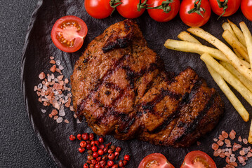Meat, juicy beef steak grilled cooked to perfection for lunch. Barbecued steak