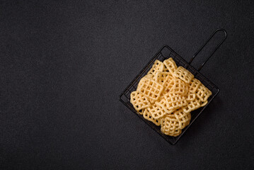 Lattice or wafer potato chips, crispy yellow snacks, takeaway food