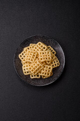 Lattice or wafer potato chips, crispy yellow snacks, takeaway food