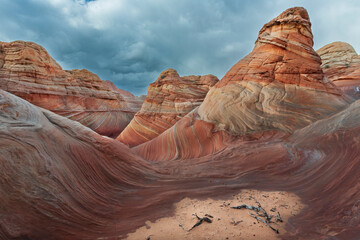 The Wave in Vermilion Cliffs, USA, showcases surreal sandstone formations with wave-like patterns...