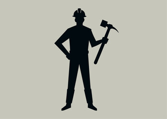 A silhouette of a miner standing confidently with a pickaxe, ready for a hard days work