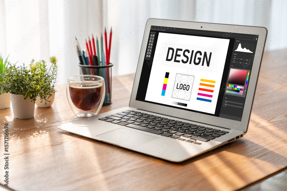 Fototapete graphic designer software for modern design of web page and commercial ads showing on the computer s