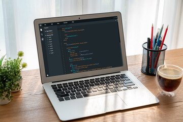 Software development programming on computer screen for modish application and program coding