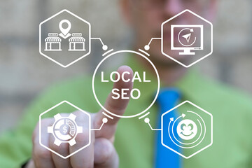 Business person using virtual touch screen presses the inscription: LOCAL SEO. Local SEO Digital...