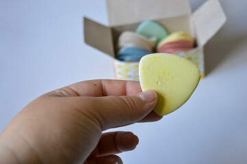 colorful tailor's chalks neatly arranged in a cardboard box, ideal for sewing, dressmaking, or...
