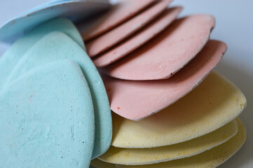 colorful tailor's chalks neatly arranged in a cardboard box, ideal for sewing, dressmaking, or...