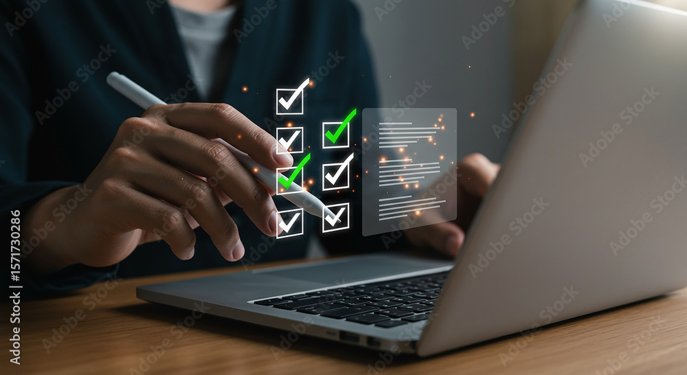 Poster person using stylus on laptop with digital checklist and document overlay for task management review