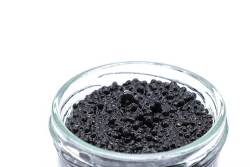 Black caviar made of vegetarian seaweed. Close up.