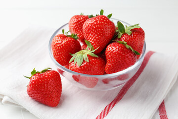 Fresh ripe strawberries on white table, closeup