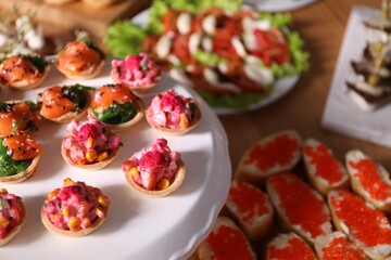 Buffet menu. Tasty stuffed tartlets on stand, closeup