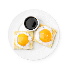 Tasty kaya toasts with half-boiled eggs and soy sauce isolated on white, top view. Traditional asian breakfast