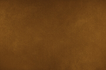 Abstract grungy texture background with different shades of dark matte orange color. Painted canvas, concrete surface, studio backdrop, grainy textured effect