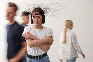 Worried woman in room with people. Confused thoughts as lines around her head. Stress, anxiety,...