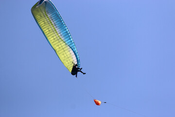 Paraglider being towed by a winch	