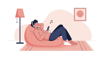 Fototapeta premium Relaxed Young Man Listening To Music On A Beanbag In A Cozy Room
