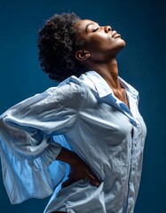 Woman with Eyes Closed Posing in Shirt Relaxed on Blue Background