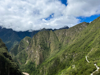 Lush Green Mountains of Machu Picchu Region under Cloudy Sky