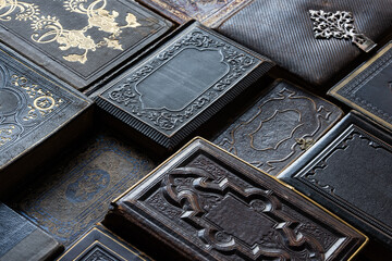 Beautiful old books with covers lie on the table and create a wonderful background for your design. Historical, scientific and religious background.