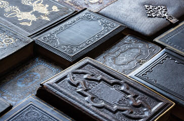 Beautiful old books with covers lie on the table and create a wonderful background for your design....