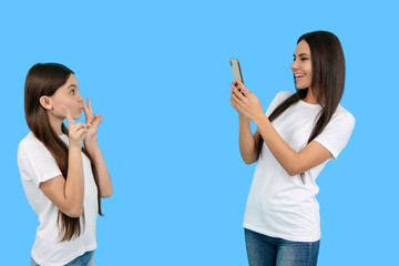 Selfie with mom and daughter. Capture the moment, cherish the memory. Portrait together with mother...