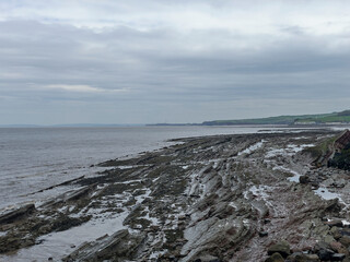 Watchet, UK, March 15, 2025. Watchet beach, coastal village, Somerset coast, England