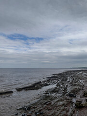 Watchet, UK, March 15, 2025. Watchet beach, coastal village, Somerset coast, England