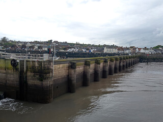 Watchet, UK, March 15, 2025. Watchet harbour marina with boats, coastal village, Somerset coast, England