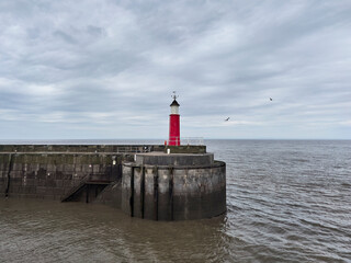 Watchet, UK, March 15, 2025. Victorian Harbour Lighthouse navigational aid, Watchet, Somerset, England, United Kingdom