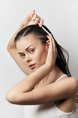 woman, beauty, hair care, grooming, personal care, close up of a woman with wet hair, combing hair,...