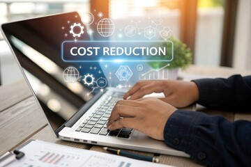 Cost reduction business finance concept. Budget management and cost management. Person using laptop with cost reduction text on virtual screen.