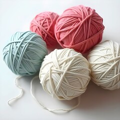 Balls of cotton thread, on a white background.