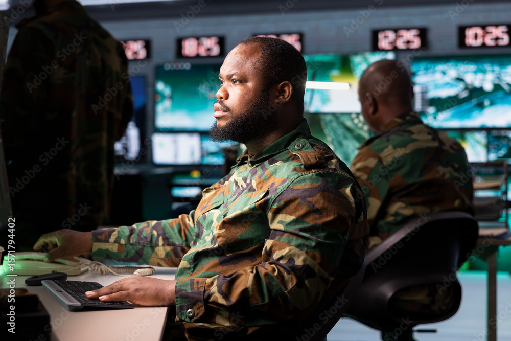 Poster military early warning systems operator in control room monitoring incoming enemy aerial attacks. af