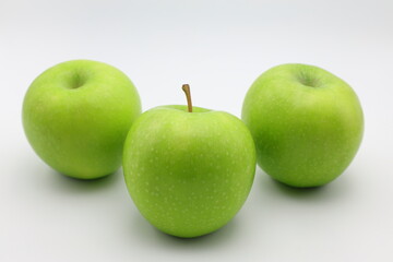 Green apples. Close up and isolated.
