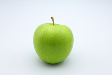 One green apple. Close up and isolated.
