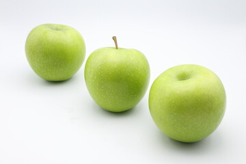 Green apples. Close up and isolated.